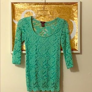 Rue 21 lace blouse with floral detail.